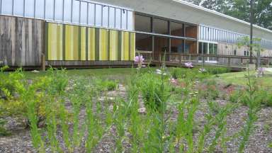 Picture of the front of the Walnut Creek Wetland Center Building