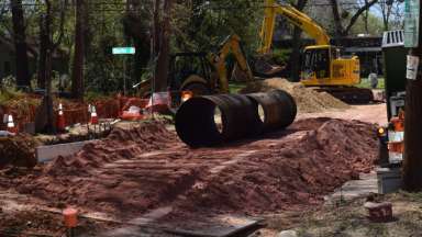 workers installing water transmission main