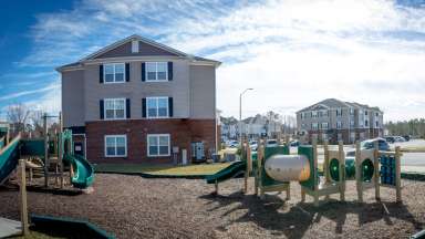 Affordable housing community buildings and playground.