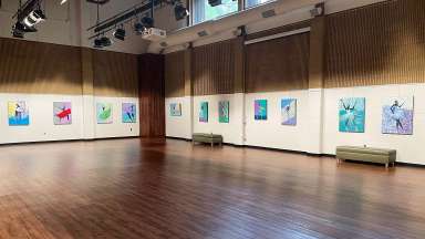 Several of Edward Baxter's paintings hang in the gallery at Sertoma Arts Center