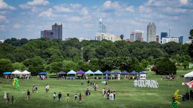 Dix Park event with Raleigh skyline