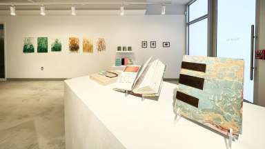 Items made in book and print artworks on display at Pullen Arts Center
