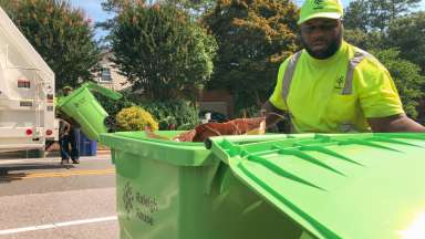 yard waste crews collecting curbside yard waste cart