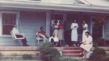 A photo of the Morgan family standing at 2206 Bedford Avenue