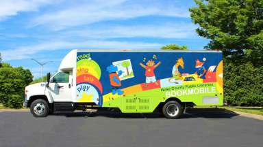 image of a colorful Bookmobile Library vehicle