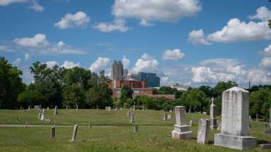 mount hope cemetery with the Raleigh skyline in the background