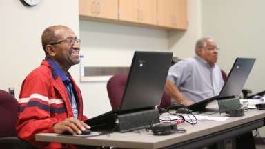 people doing research on laptops