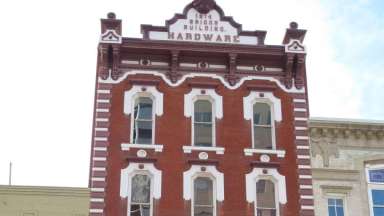 an image of a historic brick hardware building