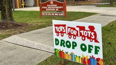 Toys for Tots signs displayed outside at Fire Station