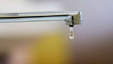 Close-up of faucet with turned drop water