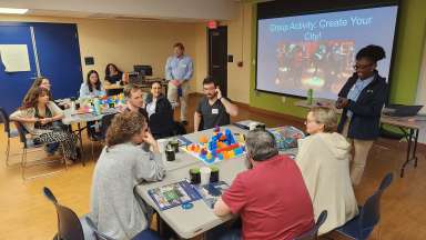 Planning Academy 2024 - Shows a group of participants doing group activities