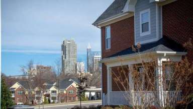 Housing and Raleigh Skyline