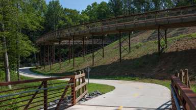 an image of the new bridge at crabtree creek west greenway trail