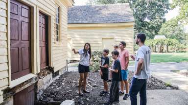 an image of tour guides showing young people Mordecai