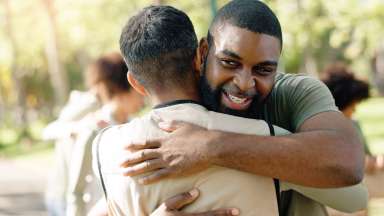 cares program hugging people