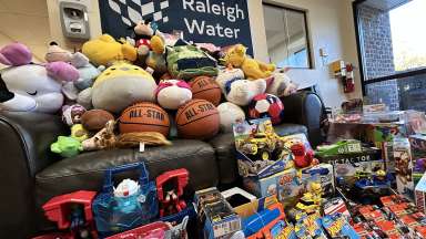 lots of toys on and near a couch
