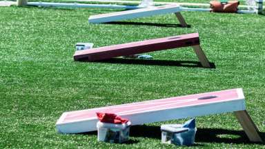 three sets of cornhole boards