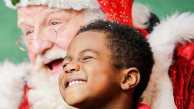 santa smiling with kid