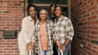 children helping elderly parent