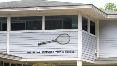 tennis building with a big tennis racket