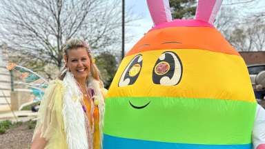 a colorful inflatable egg/bunny with Sunny the Fun Fairy