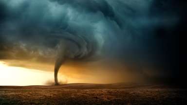 tornado spinning across a field