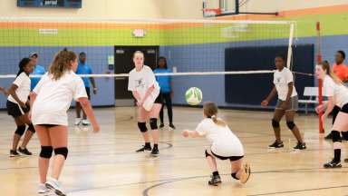 kids playing volleyball indoor