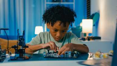 a kid building a robotics system