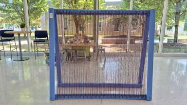 Photograph of a large blue loom