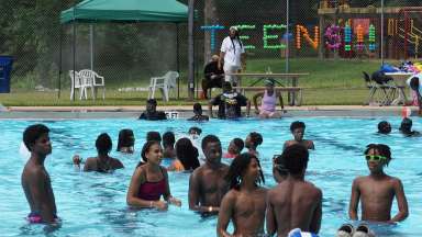 teens at the pool having fun in the sun