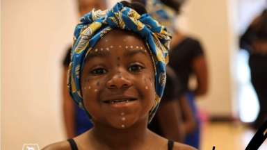 a child in a dance show