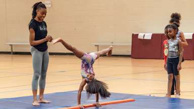 a kid doing Gymnastics