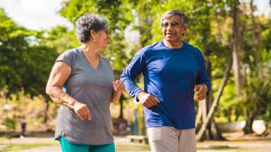 two people exercising outside
