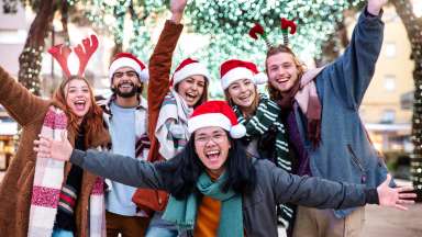 adults with christmas attire on