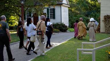 people touring Mordecai with actors