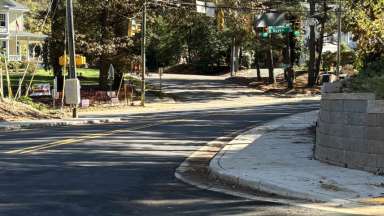 road with signs and trees