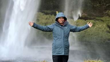a person in iceland chasing waterfalls