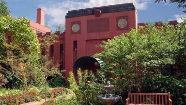 Exterior of a brick armory building that's used as a community theater