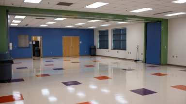 A large open room which can be divided into to separate meeting rooms