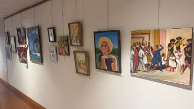 Paintings hanging in a Hallway