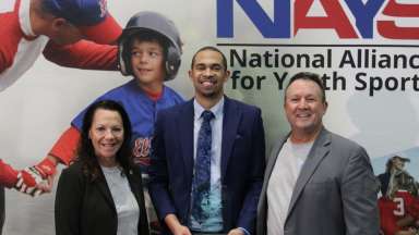 Raleigh Parks' staff smiling while receiving NAYS award