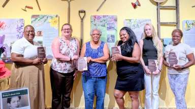 a group of people in Evelyn's Book Club