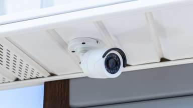 CCTV camera connected to house roof