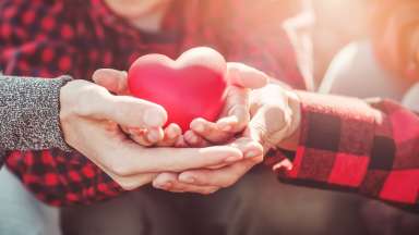 hands holding a heart