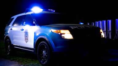 An RPD car at night with its lights on