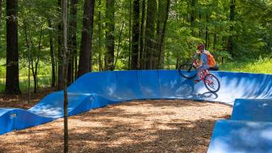 a person on a bike on the Pump Track