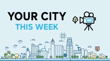 "Your City, This Week" logo with illustration of city scape and video camera