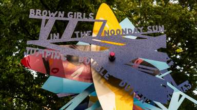 Colorful, artist-designed bus shelters and a sculptural bench along Poole Road and at the Neuse River trailhead.