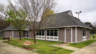 Front view of Southgate Park Community Center with trees in background