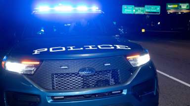 Raleigh police car with sirens flashing